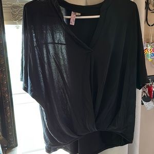 V-neck. Black soft buttery material.